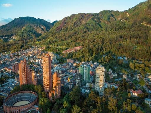 A view of the center of Bogota with the Andes in the background