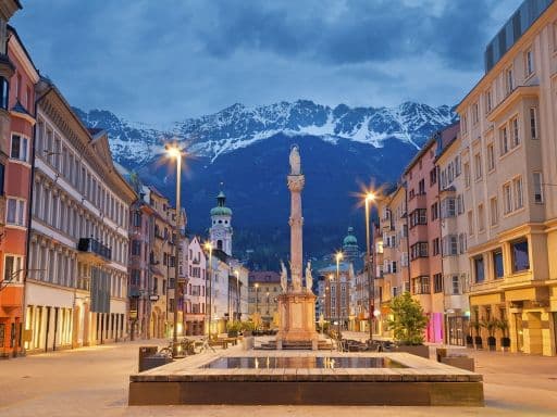 Innsbruck, Austria during twilight with European Alps